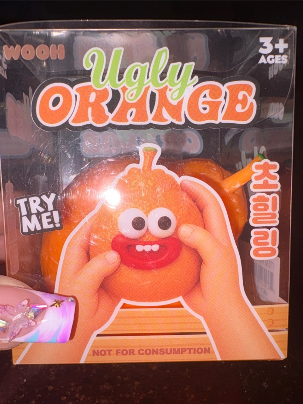 WOOH NIB: ugly Orange with eyes and lips with teeth. Squish, pinch , squeeze:$12